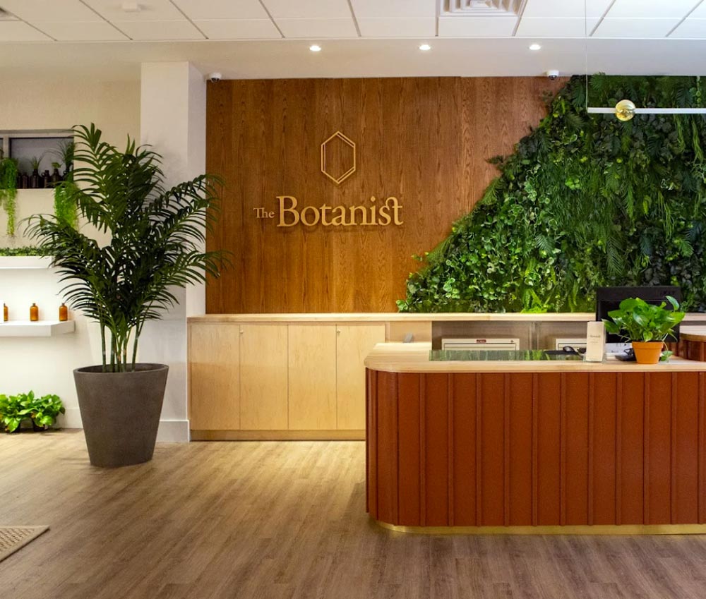 Front Desk with Logo Wall at The Botanist Worcester Dispensary